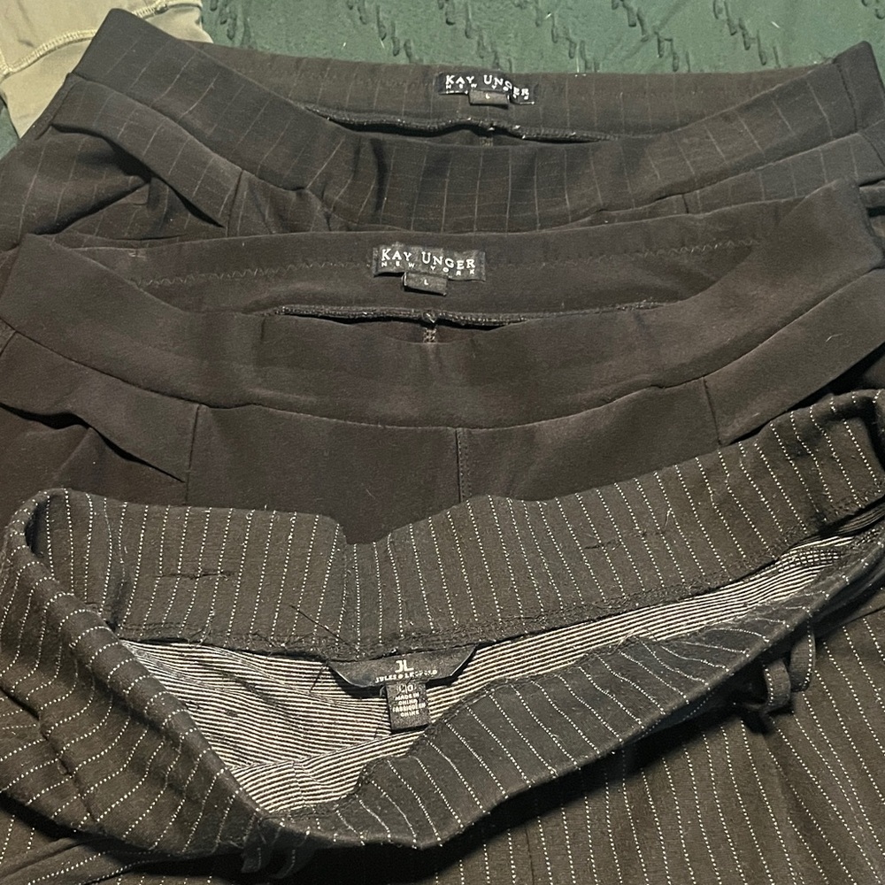 Three pair worn dress pants
